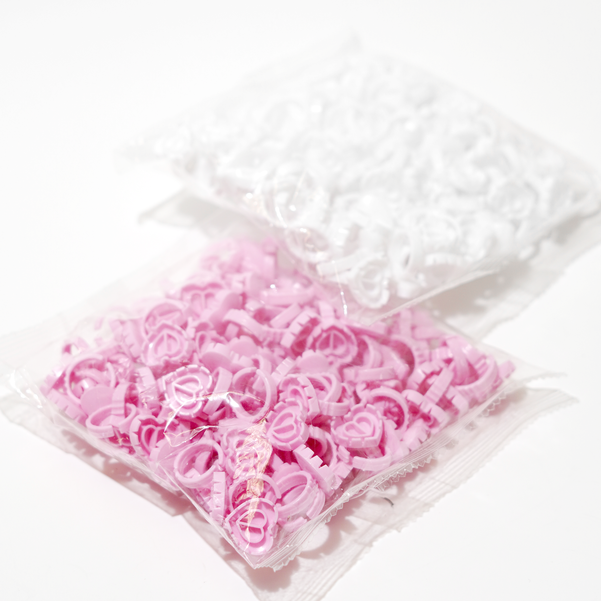 glueringspink_whiteinbags.png